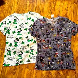 Two Disney scrub tops, size XS, Halloween and St. Patrick’s Day‎